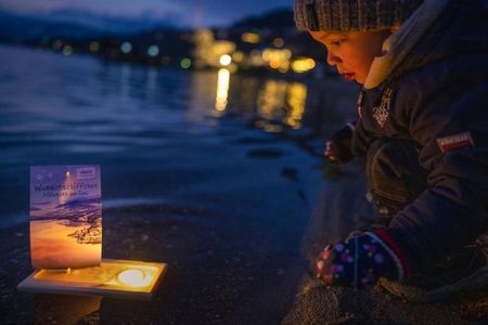 Millstätter See: Wunsch-Schiffchen auf Reisen schicken