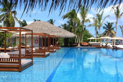 Reisen und Urlaub: Luxus unter Palmen - Das neu eröffnete Villenresort „The Residence Maldives“ lockt  ins Inselparadies