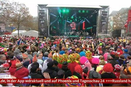 Karneval geht weiter, der Krieg bleibt dank Nachrichtenband immer dabei