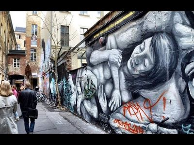 Die Berliner Mauer, von internationalen Graffiti-Künstlern bemalt