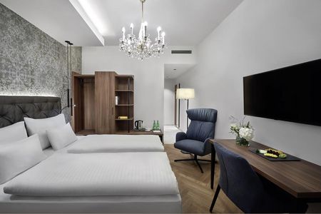 Mit viel Liebe zum Detail eingerichtet, verspricht das Design Zimmer im Hotel Schwarzer Adler Innsbruck höchsten Komfort für Gäste