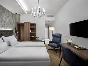 Mit viel Liebe zum Detail eingerichtet, verspricht das Design Zimmer im Hotel Schwarzer Adler Innsbruck höchsten Komfort für Gäste